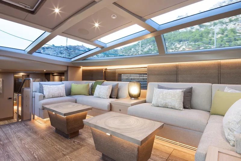 Liara Yacht Photos Pics Luxurious interior of 2019 Baltic Custom 112 yacht with modern seating and skylight.