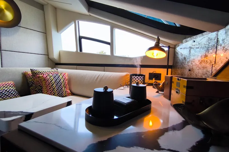 Mister Corn Yacht Photos Pics Luxurious interior of 2010 Rodman Muse 74 yacht with modern decor and ambient lighting.