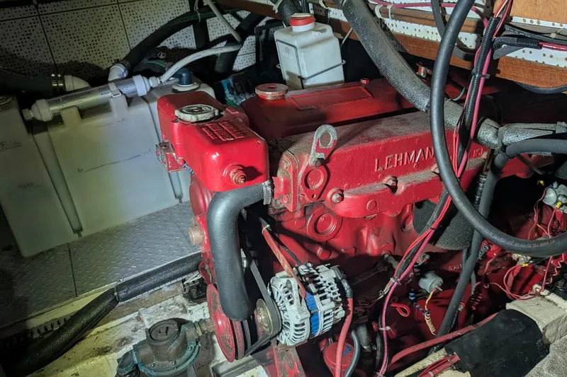 Moments Notice Yacht Photos Pics Engine room of 1981 Sea Ranger 47 with Lehman engine, hoses, and wiring.