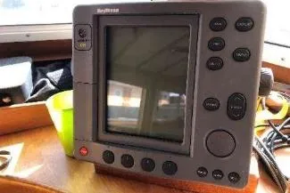 Moments Notice Yacht Photos Pics 1981 Sea Ranger 47 boat navigation system with display and control buttons.