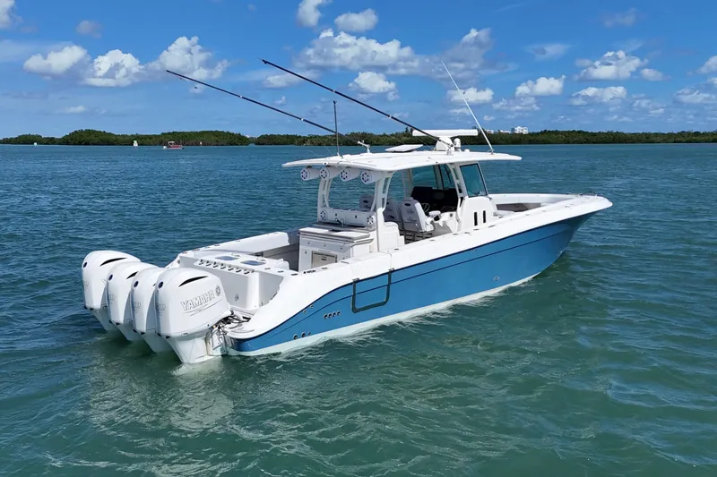  Yacht Photos Pics 2017 HCB 42 Siesta boat with four Yamaha engines on blue water.