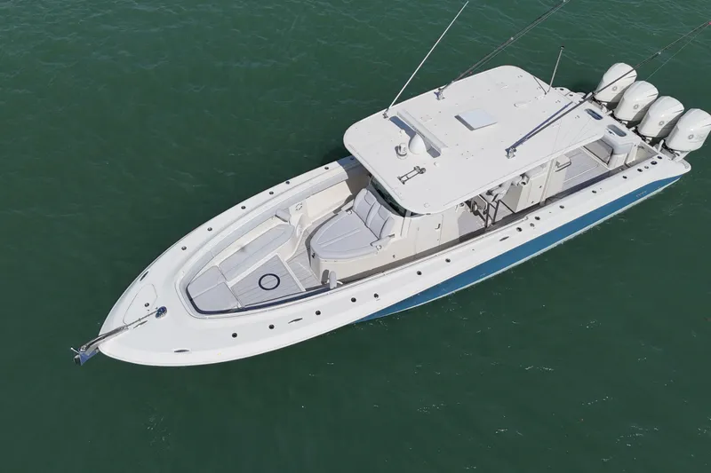  Yacht Photos Pics 2017 HCB 42 Siesta boat on water, aerial view, sleek design, multiple outboard engines.