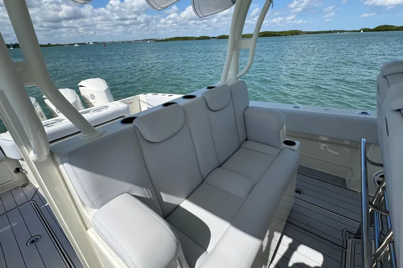  Yacht Photos Pics 2017 HCB 42 Siesta boat with white seating, ocean view, and clear skies.