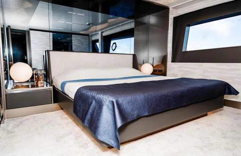  Yacht Photos Pics Luxurious bedroom interior of 2020 Ferretti Yachts 850 with modern design and elegant decor.