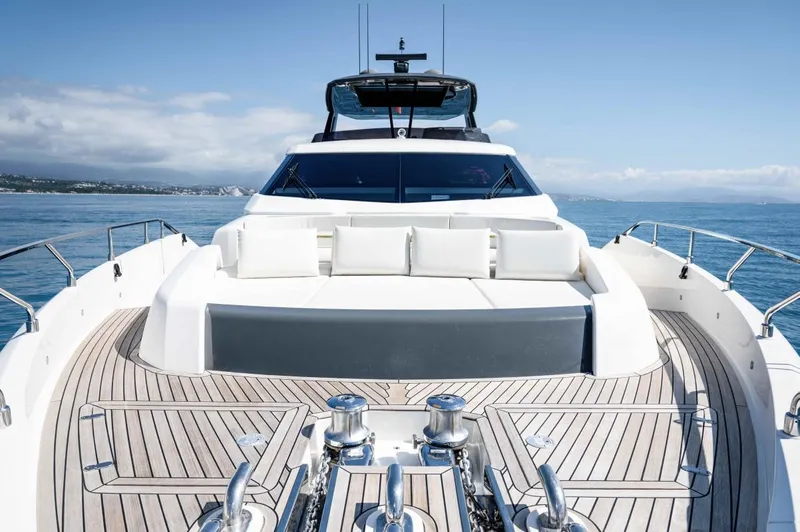  Yacht Photos Pics Luxurious 2020 Ferretti Yachts 850 on open sea, featuring elegant deck and seating area.