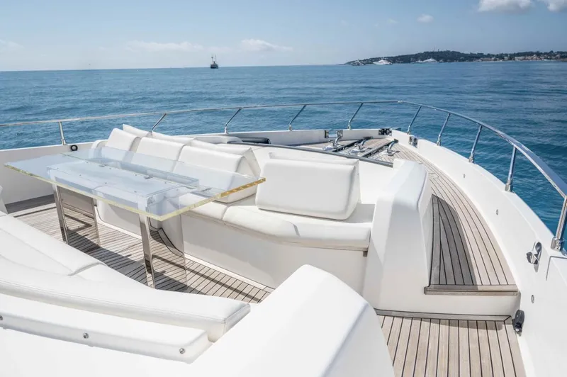  Yacht Photos Pics Luxurious 2020 Ferretti Yachts 850 deck with elegant seating and ocean view.
