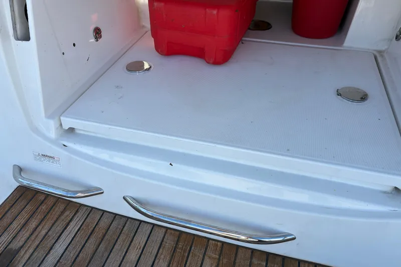 Star IV Yacht Photos Pics Under Stern steps is access to Life raft and Gen Set compartment.