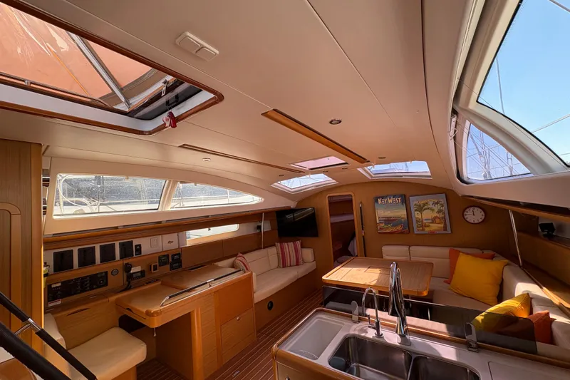 Star IV Yacht Photos Pics Interior of 2010 Jeanneau 50DS yacht with modern design and comfortable seating.