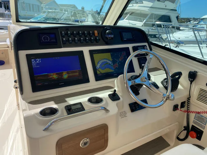 Lola Yacht Photos Pics 2017 Grady-White Freedom 375 helm with dual displays and steering wheel.
