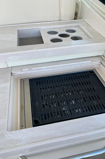 Lola Yacht Photos Pics Grady-White Freedom 375 2017 boat grill and cup holders on deck.