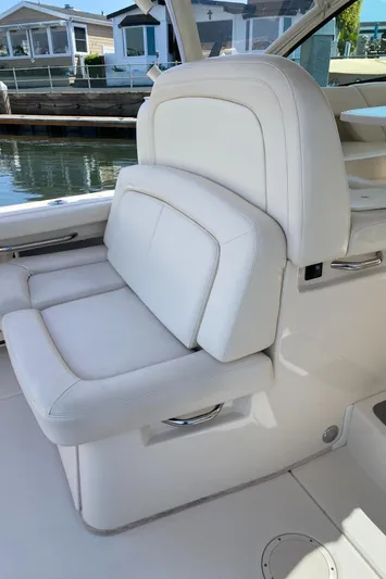 Lola Yacht Photos Pics 2017 Grady-White Freedom 375 boat seat, white leather, dockside view.