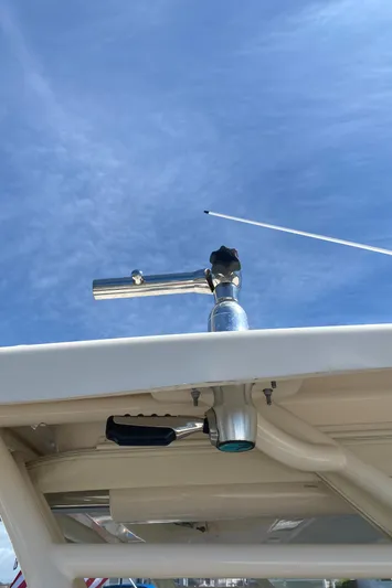 Lola Yacht Photos Pics Grady-White Freedom 375 boat detail, 2017 model, featuring a metal rod holder against a clear sky.