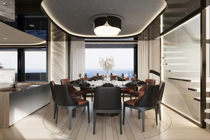  Yacht Photos Pics Luxurious dining area on 2026 Sunreef Ultima 111 yacht with elegant decor and ocean view.