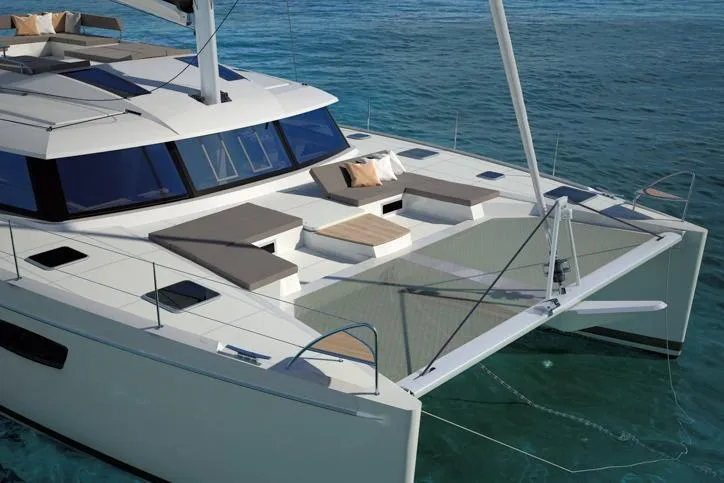 Nowhere Yacht Photos Pics 2016 Fountaine Pajot SABA 50 catamaran with spacious deck and modern design on calm waters.