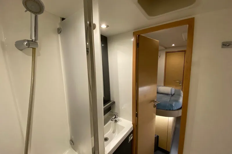 Nowhere Yacht Photos Pics Bathroom and cabin interior of 2016 Fountaine Pajot SABA 50 yacht.