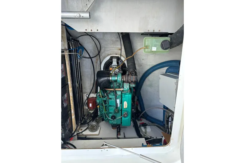 Nowhere Yacht Photos Pics Engine compartment of 2016 Fountaine Pajot SABA 50 catamaran, showcasing mechanical components.