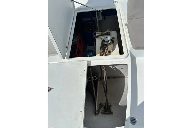 Nowhere Yacht Photos Pics Open storage compartments on 2016 Fountaine Pajot SABA 50 catamaran deck.