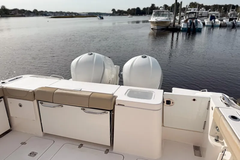  Yacht Photos Pics 2016 Pursuit OS 355 Offshore boat with dual engines docked at marina.