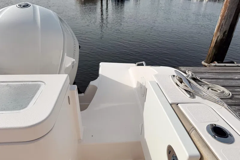  Yacht Photos Pics 2016 Pursuit OS 355 Offshore boat docked, featuring Yamaha outboard motor and deck details.