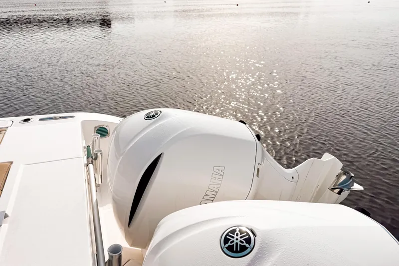  Yacht Photos Pics 2016 Pursuit OS 355 Offshore boat with Yamaha outboard engines on calm water.