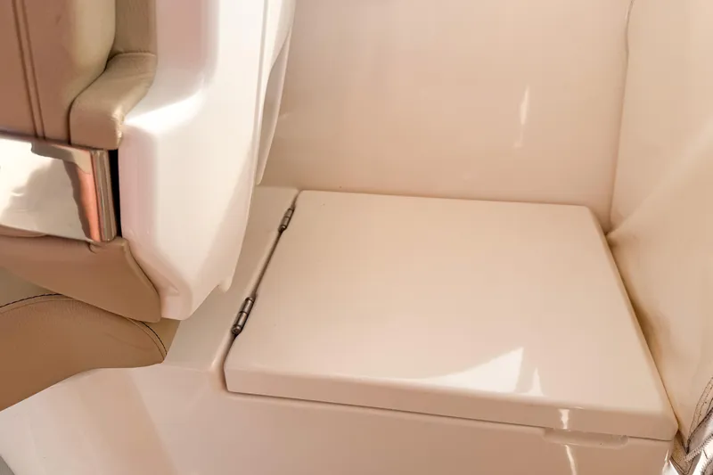  Yacht Photos Pics 2016 Pursuit OS 355 Offshore interior seat detail with beige upholstery and sleek design.