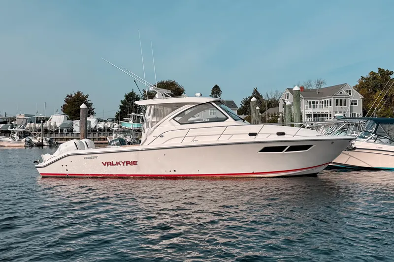  Yacht Photos Pics 2016 Pursuit OS 355 Offshore boat named Valkyrie docked in a marina.