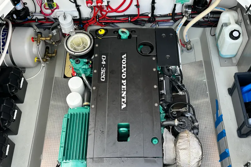  Yacht Photos Pics Volvo Penta engine in 2023 Sargo 28 boat, detailed view of engine compartment.