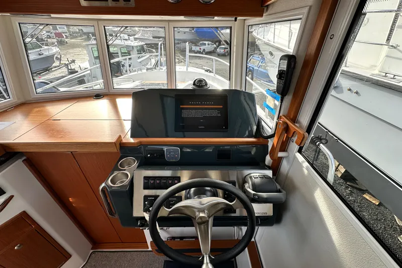  Yacht Photos Pics Interior helm of 2023 Sargo 28 boat with modern controls and navigation system.