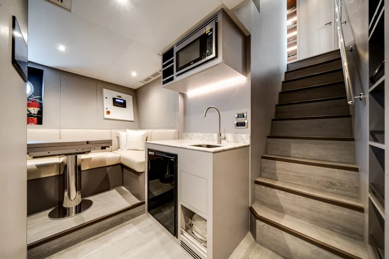  Yacht Photos Pics Interior of Ocean Alexander 35P yacht, modern kitchen and stairs, year 2026.