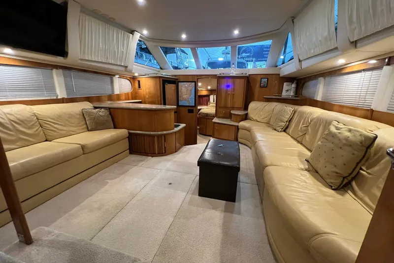  Yacht Photos Pics Luxurious interior of 2001 Carver 396 Motor Yacht with plush seating and elegant design.