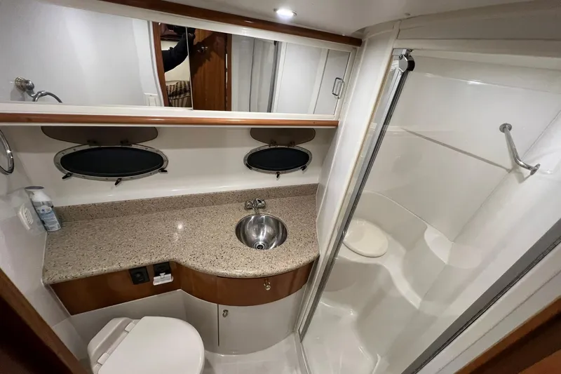  Yacht Photos Pics Luxurious bathroom in 2001 Carver 396 Motor Yacht with shower and vanity.