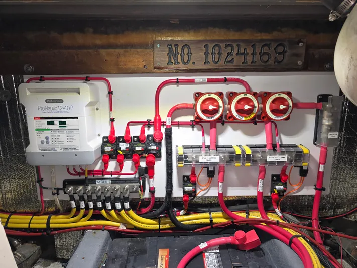 Aurora Yacht Photos Pics Electrical system of a 1982 Tollycraft 37 Sportfish/Convertible boat, featuring ProNautic charger.