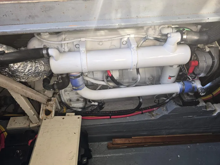 Aurora Yacht Photos Pics Engine compartment of 1982 Tollycraft 37 Sportfish/Convertible boat, showing detailed components.