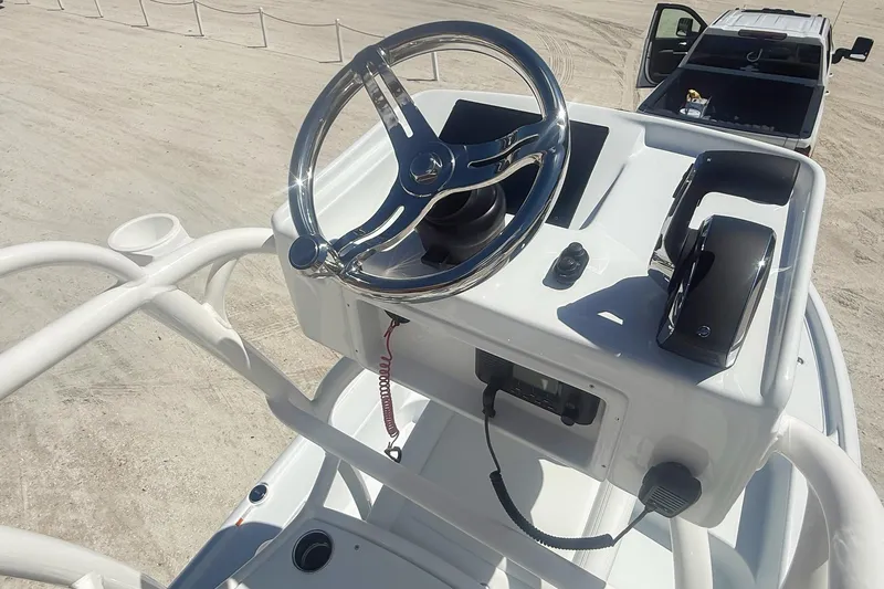  Yacht Photos Pics Steering console of 2026 Yellowfin 24 Bay CE boat, featuring modern controls and sleek design.