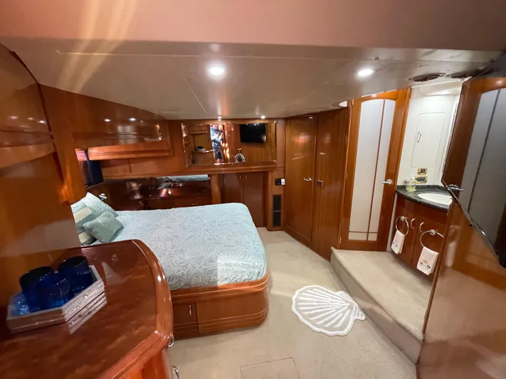 Just A Dream Yacht Photos Pics Luxurious interior of a 2005 Carver 56 Voyager yacht with elegant wood finishes.