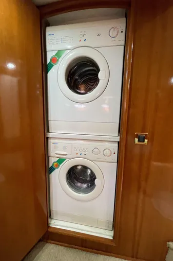 Just A Dream Yacht Photos Pics Stacked washer and dryer inside 2005 Carver 56 Voyager yacht.