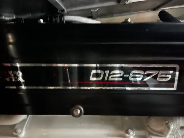 Just A Dream Yacht Photos Pics Close-up of a 2005 Carver 56 Voyager engine, featuring D12-675 V8 label.