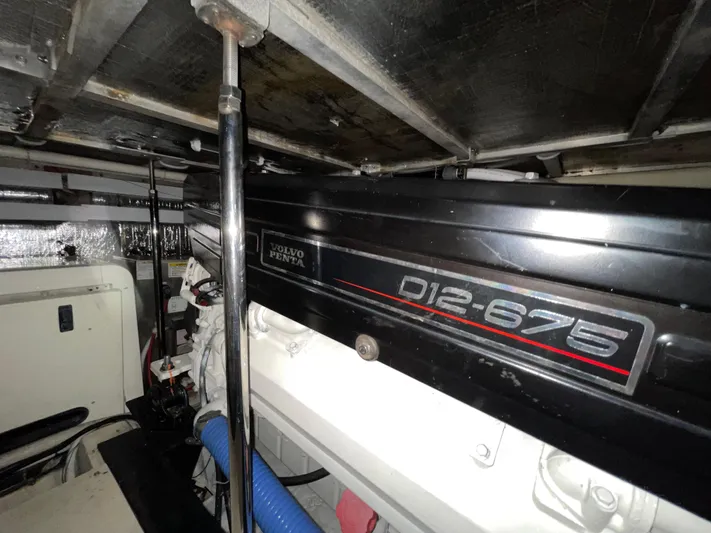 Just A Dream Yacht Photos Pics Engine room of 2005 Carver 56 Voyager with Volvo Penta D12-675 engine.