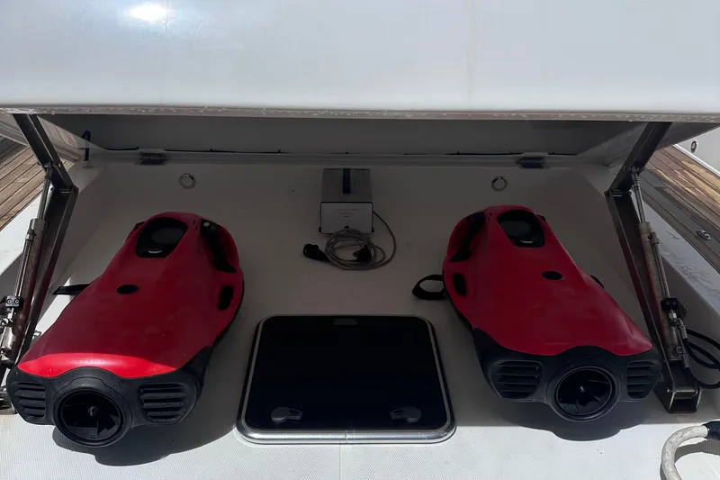 Uni Yacht Photos Pics Storage compartment on a 2020 Fjord 44 Open yacht with two red underwater scooters.