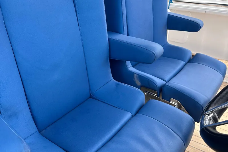 Uni Yacht Photos Pics Blue seats on a 2020 Fjord 44 Open boat, showcasing luxury and comfort.