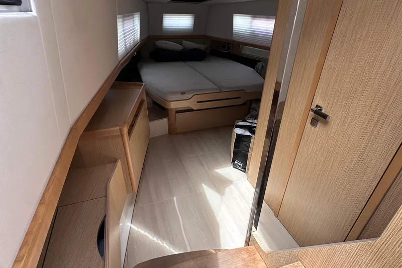 Uni Yacht Photos Pics Interior of 2020 Fjord 44 Open yacht cabin with modern wood finish.