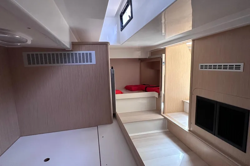 Uni Yacht Photos Pics Interior of 2020 Fjord 44 Open yacht, featuring modern wood paneling and compact design.