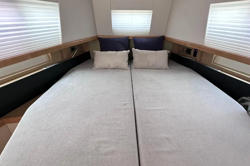 Uni Yacht Photos Pics Interior cabin of 2020 Fjord 44 Open yacht with twin beds and modern decor.