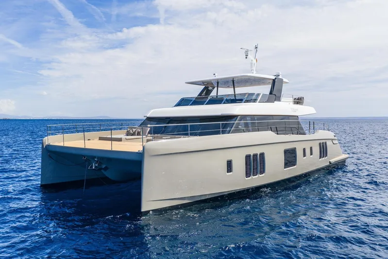Vahewa Yacht Photos Pics 2024 Sunreef Power Cat luxury yacht on open sea, showcasing sleek design and modern features.