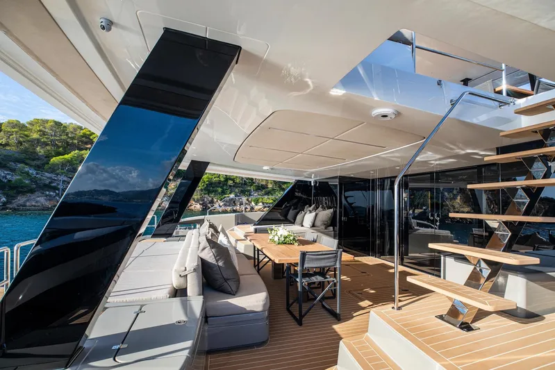 Vahewa Yacht Photos Pics Luxurious 2024 Sunreef Power Cat yacht deck with elegant seating and scenic ocean view.