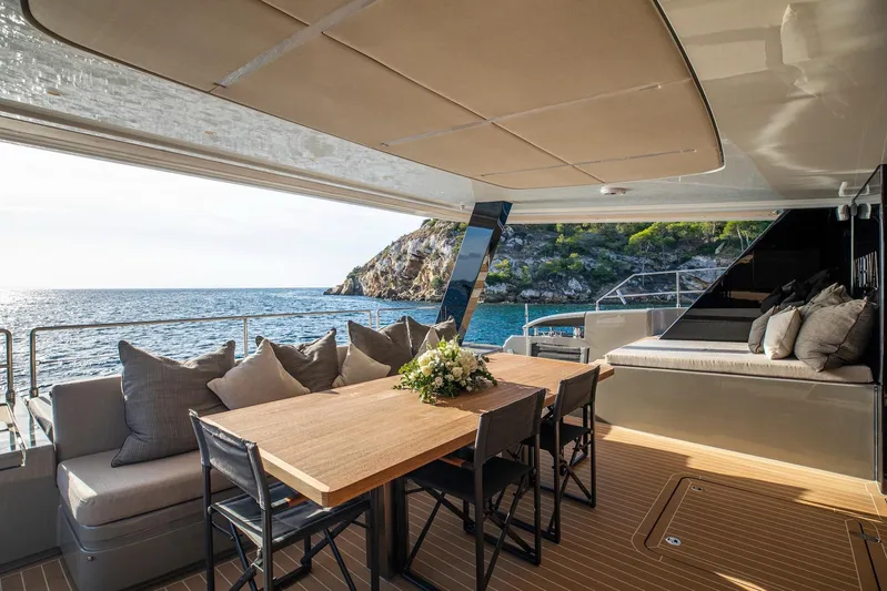 Vahewa Yacht Photos Pics Luxurious 2024 Sunreef Power Cat yacht deck with elegant seating and ocean view.