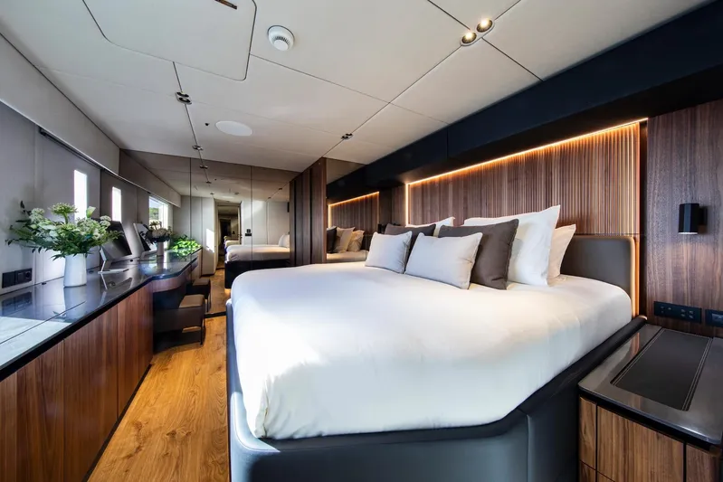Vahewa Yacht Photos Pics Luxurious 2024 Sunreef Power Cat cabin with elegant wood accents and modern decor.