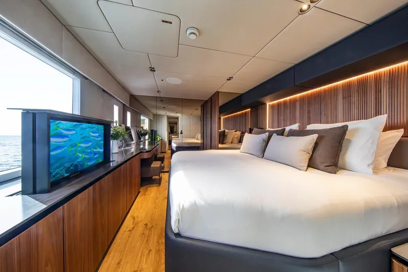 Vahewa Yacht Photos Pics Luxurious 2024 Sunreef Power Cat cabin with elegant decor and ocean view.