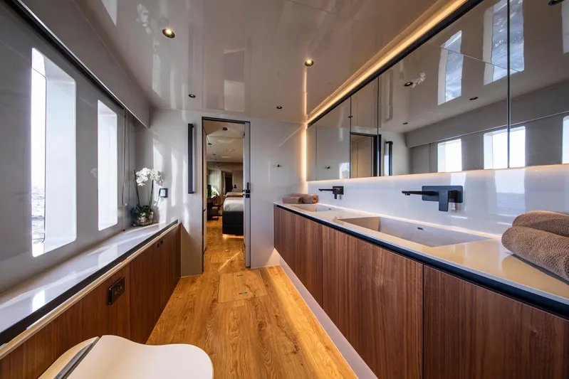 Vahewa Yacht Photos Pics Luxurious bathroom interior of 2024 Sunreef Power Cat yacht with modern fixtures and wood accents.