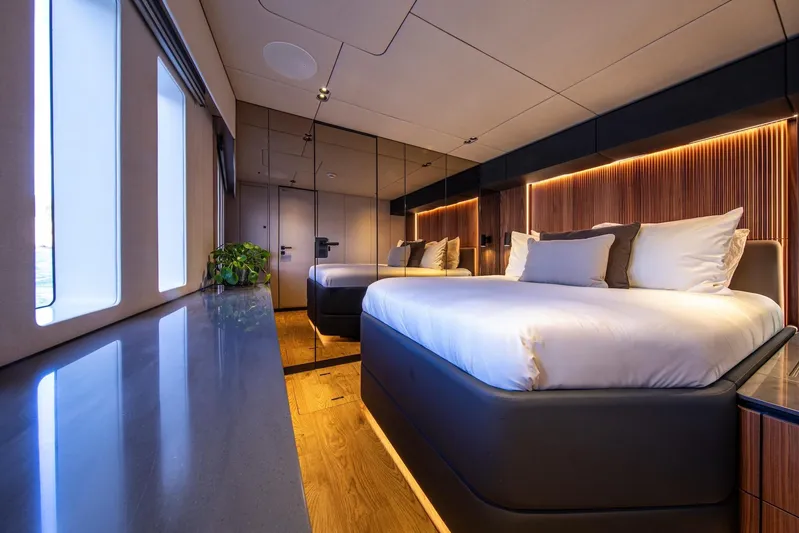 Vahewa Yacht Photos Pics Luxurious bedroom interior of 2024 Sunreef Power Cat yacht with modern design and ambient lighting.